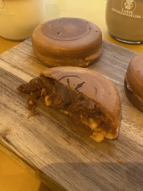 I actually got to eat a spicy beef and cheese-filled wheel cake!