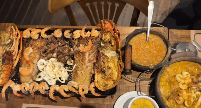You absolutely can't miss this seafood restaurant in Rio! 🦞✨