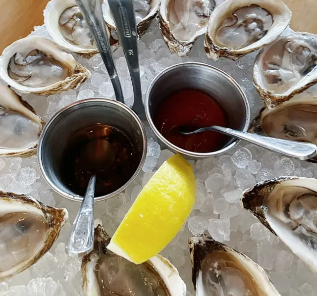 Treasure Bar in Boston! One oyster per knife on Viale