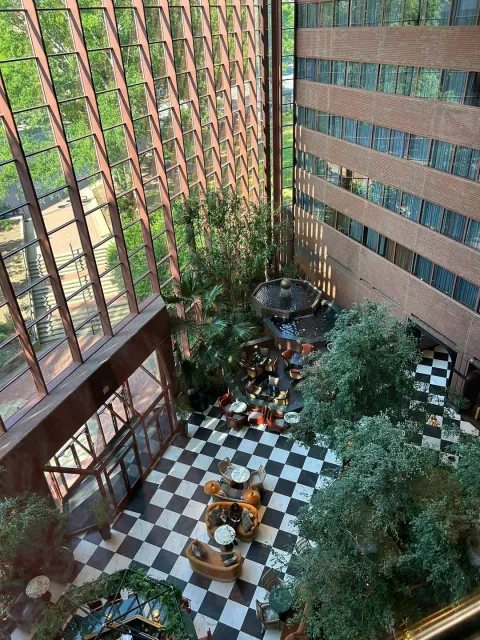 Cozy Hotel with a Beautiful Atrium Bar 🍹🌿