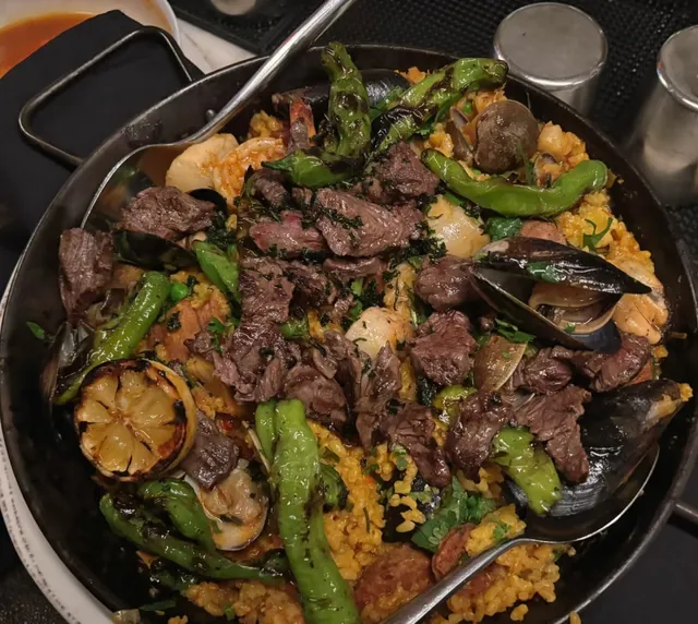 Houston | Who could resist a seafood risotto covered with beef?