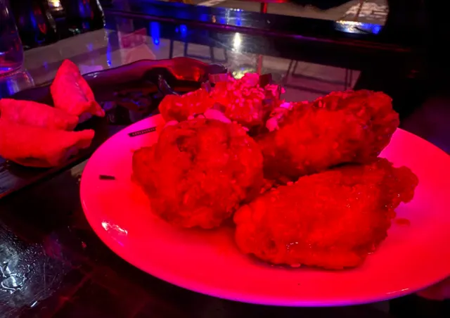 A Heartwarming Bowl of Ramen in the Dim Light of a Bar