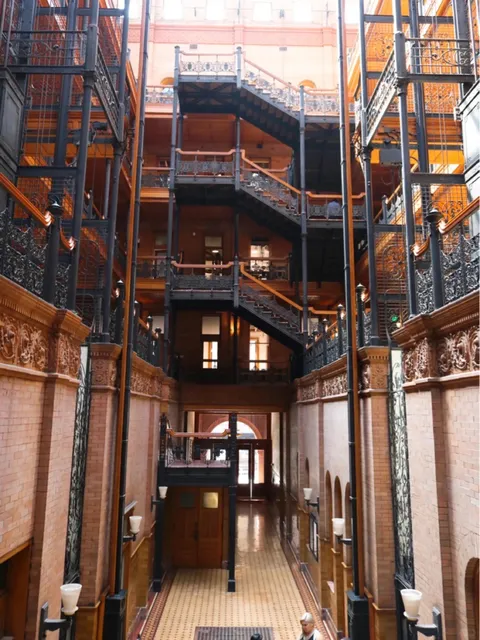  Bradbury Building: LA’s Time-Travel Portal to Victorian Elegance 🎞️